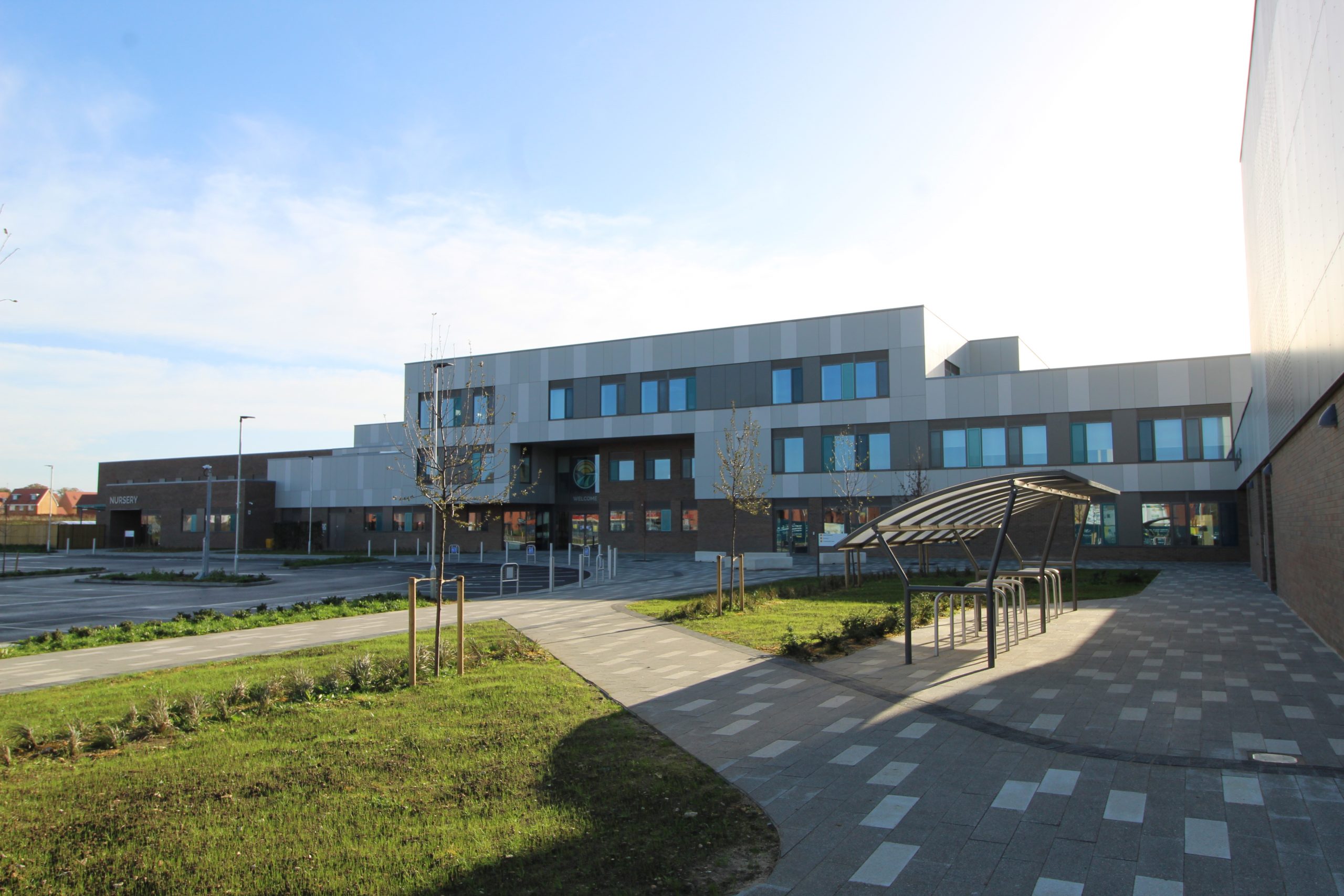 QIC’s ‘Upstanding’ raft ceiling perimeter profile provides integral support to outstanding school refurbishment.